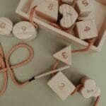 Wooden lacing toy with numbers and geometry shapes