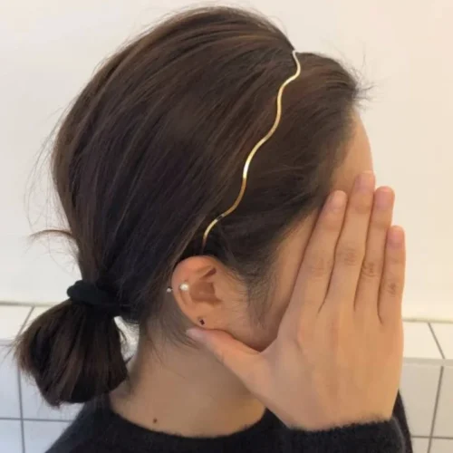 Goldenes Stirnband