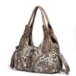Stylische Handtasche mit Leo-Muster und braunem Leder-Design, perfekte Wahl für modebewusste Damen, ideal für den Alltag oder besondere Anlässe, hochwertig verarbeitet und funktional.