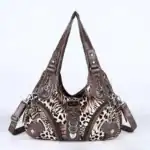Stylische Designerhandtasche mit Animal-Print, elegantes Leder und praktischen Fächern, perfekt für Fashion-Highlights und viel Stauraum. Hochwertige Verarbeitung für stilbewusste Frauen.