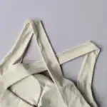 Weißer Stoffgurt, Picnic-Tasche, moderne Tragetasche mit langen Griffen, umweltfreundlicher Einkaufskorb, nachhaltiges totes Material, stylischer Einkaufskorb, Shopping-Bag für umweltbewusste Kunden, wiederverwendbare Einkaufstasche, umweltfreundlicher Alltagsbegleiter, langlebige Stofftasche, nachhaltige Tragetasche, modischer, umweltfreundlicher Einkaufsbegleiter.