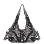 Stylische Damenhandtasche im Animal-Print mit schwarzen Leder-Details, praktischen Zipper-Fächern und zahlreichen Detaillösungen, perfekt für Modebewusste und trendige Outfits.