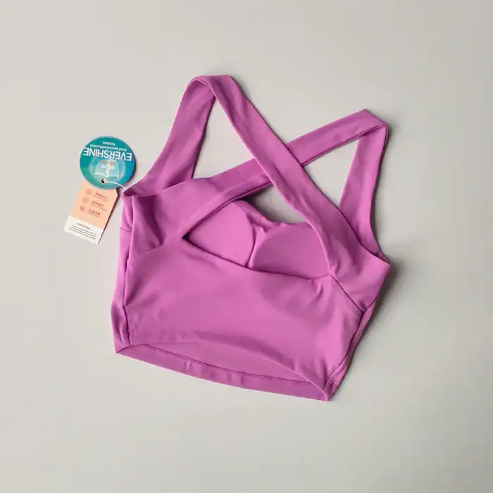 Sports-bh in leuchtendem pink, elastisch, bequemer trägersport-bh für yoga, fitness und training, atmungsaktiv, hochwertig verarbeitet, OutletLite, Damen Sportbekleidung, Komfort, Sportmode, aktiver Lebensstil.