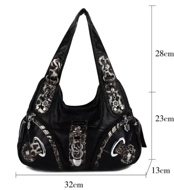 Rissige schwarze Handtasche mit Leopardenmuster, Metall- und Schnallenakzenten, ideal für stilbewusste Damen.