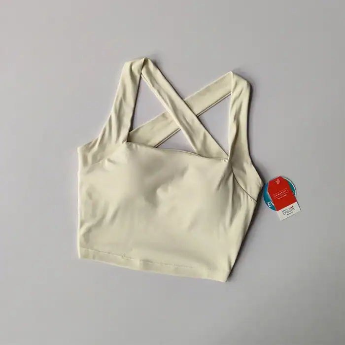 Bequemer, weißer Sport-BH aus atmungsaktivem Material, ideal für Yoga, Fitness und Freizeit.