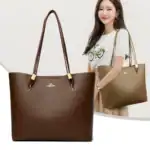 Edle Damenhandtasche aus hochwertigem braunem Leder mit goldenen Akzenten, ideal für Fashion und Alltag.