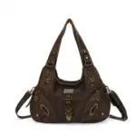 Vintagetragetasche aus braunem Leder mit vielen Zipper- und Dekorationsdetails, ideal für stilvolle Damen.