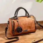 Stilvolle Ledertasche mit Hand- und Schultergurt, zeitloses Design, praktische Innenfächer und robuste Verarbeitung aus hochwertigem Material für elegante Alltagstasche.