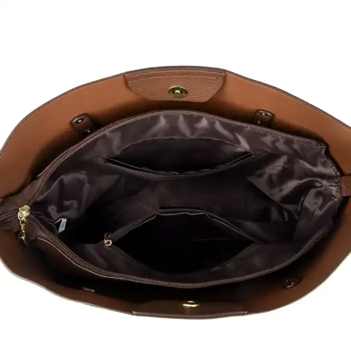 Geräumige Handtasche mit mehreren Innenfächern, ideal für stilvolles und funktionales Tragen. Perfekt für den Alltag, Reisen oder Bürogebrauch, bietet viel Stauraum und Organisation.