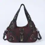 Moderner Damenhandtasche mit kombinierten Schwarz- und Weinrot-Tönen, praktischen Reißverschlüssen und dekorativen Gold-Details, ideal für stilvolles Stadt- und Alltagsshopping.