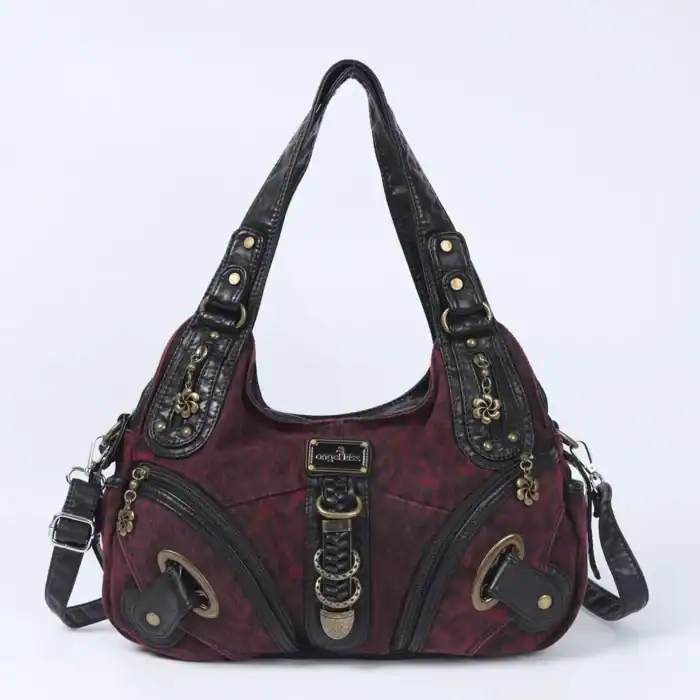 Moderner Damenhandtasche mit kombinierten Schwarz- und Weinrot-Tönen, praktischen Reißverschlüssen und dekorativen Gold-Details, ideal für stilvolles Stadt- und Alltagsshopping.